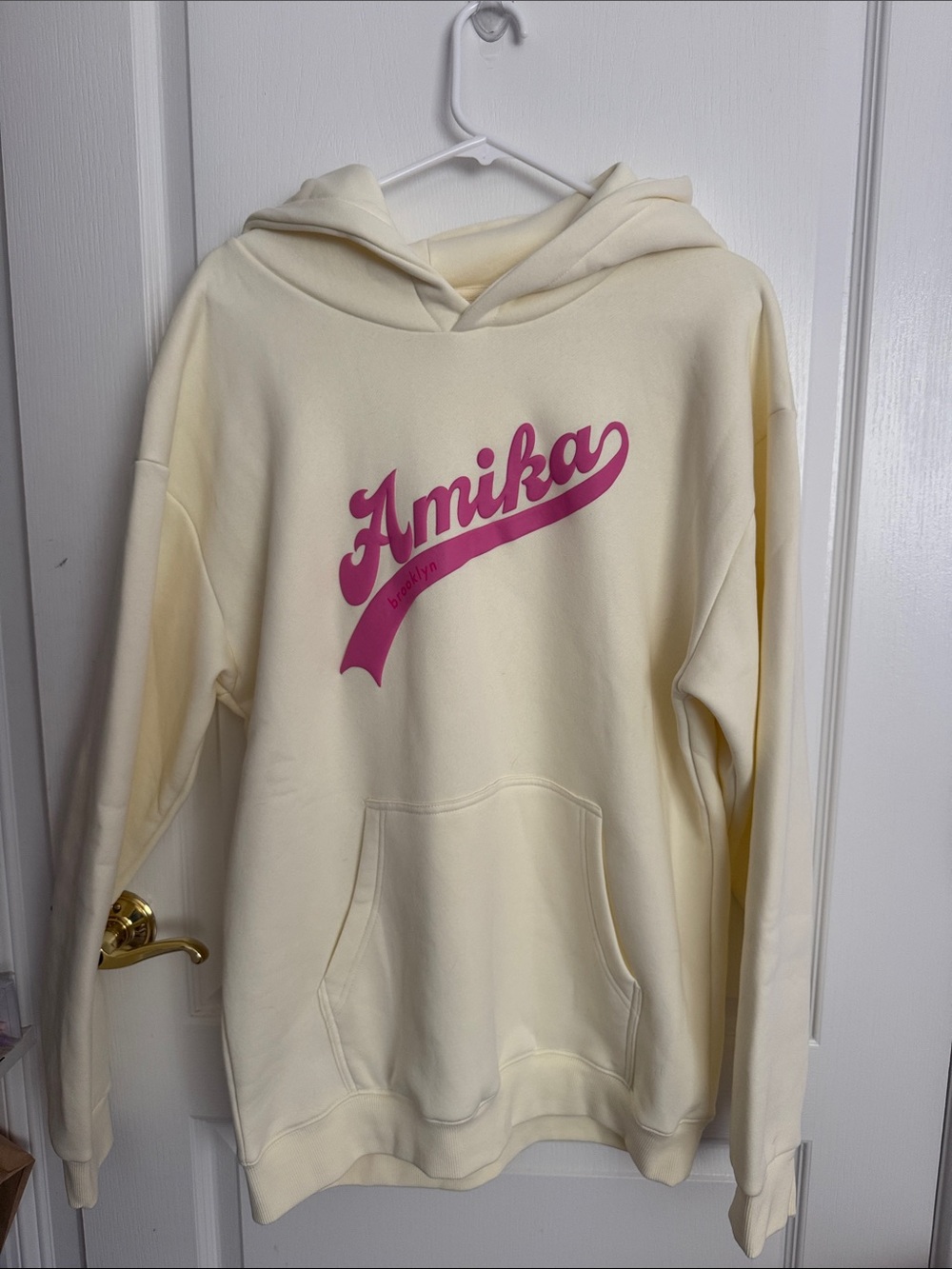 amika Cream Hoodie with Pink Script Logo